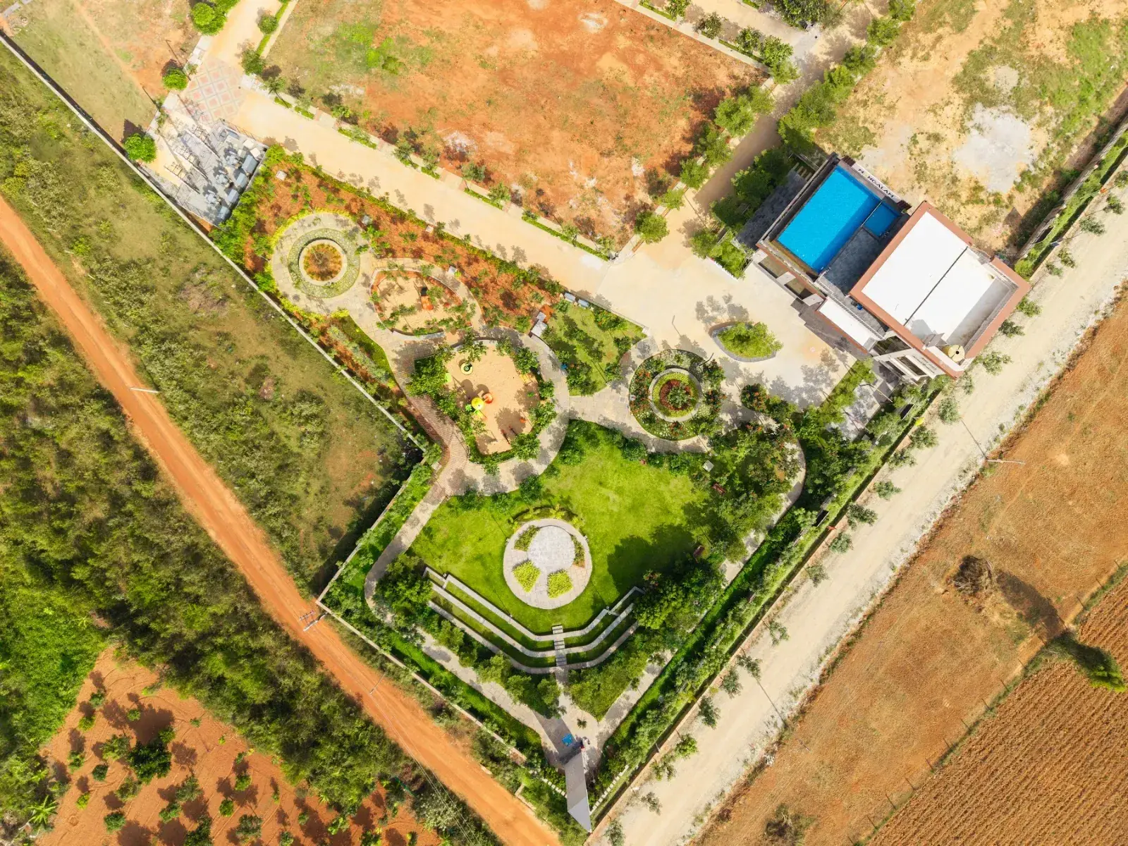 Aura Ville clubhouse and parks from the air